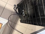 an image of a room with a heater and a door