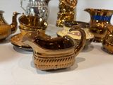 many different vases and bowls on the table