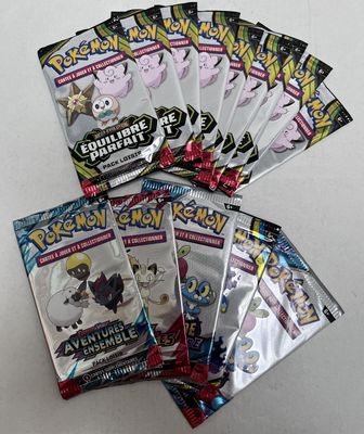 a bunch of pokemon trading cards sitting on top of each other