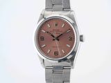 an image of a lady ' s wrist watch with a pink dial