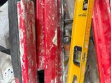 a tool in the back of a bag with tools inside of it