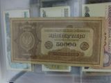 a picture of a bank note in a glass case