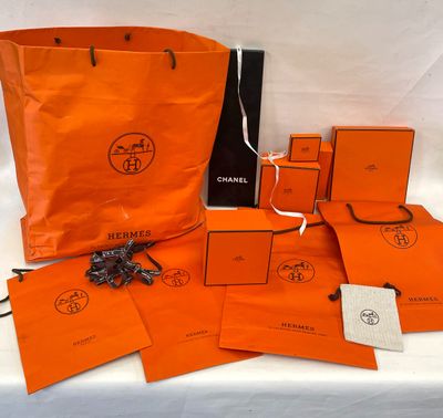a bunch of orange bags sitting on top of a table