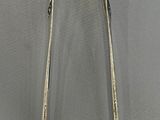 a close up of a pair of tonges on a table