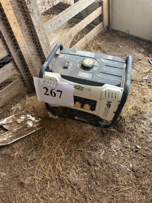 a small generator that is sitting on the ground