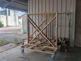 a cart that is sitting in front of a building