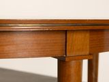 an image of a close up of a table with a wooden top