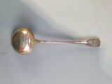 a spoon that is sitting on a table