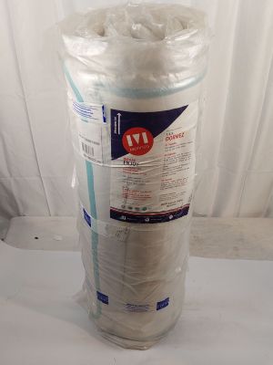 a roll of toilet paper wrapped in plastic on a table