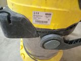a close up of a yellow and black fire hydrant