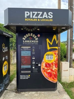 un distributeur automatique sur lequel est représentée une pizza