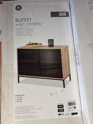 two boxes of furniture are stacked on top of each other in a store