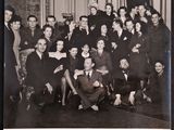 black and white photograph of a group of people posing for a picture