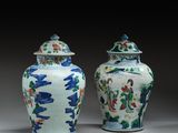 pair of blue and white vases with oriental designs on them