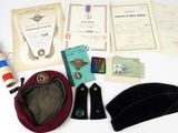 an image of a collection of military items including a hat and other items
