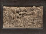 une image représentant un relief représentant un groupe de personnes, dans un cadre en bois