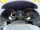 a car dashboard with a speedometer and gauges on it