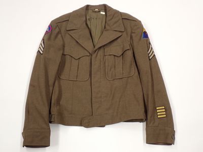 an image of a military jacket on a hanger