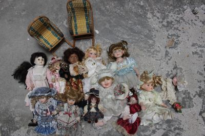 a lot of dolls that are sitting on the floor