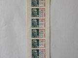 a picture of a stamp with a picture of a man on it