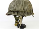 an image of a helmet on a stand on a white background