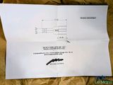 a piece of paper that has a drawing of a screw on it