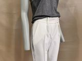 grey tank top and white pants on a mannequin mannequin mannequin mannequin mannequin mannequin mannequin mannequin