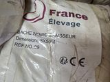 a pile of bags of rice sitting on top of each other