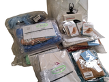 many bags of food that are sitting on a table