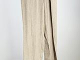 an image of a pair of pants hanging on a clothes rack