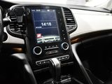 a car dashboard with a cell phone attached to it