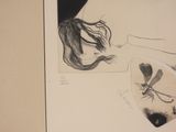 a drawing of a woman and a dragonfly on a piece of paper
