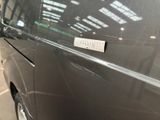 a black van with a sticker on the side of it
