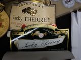 a sign that says lucky therey and a bottle of champagne