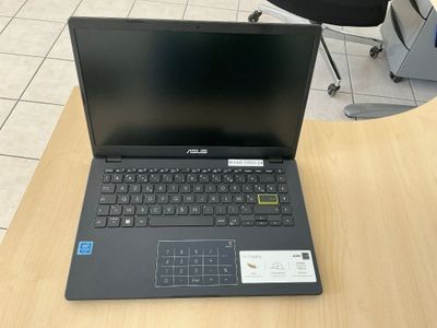 a laptop that is sitting on a table in the room