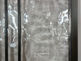 an image of a glass block window with a horse on it