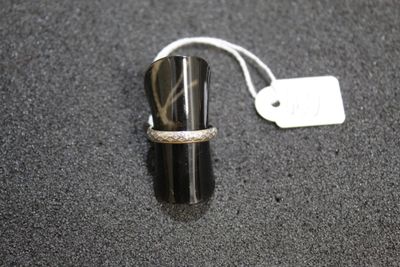 a ring that has a tag attached to it