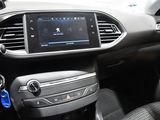 the dashboard of a car with a digital display in the center