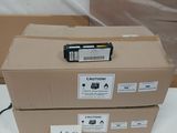 two boxes that are stacked on top of each other on a table