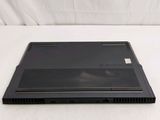 an open laptop computer sitting on top of a white surface