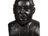 statue of a man with a sad look on his face