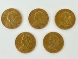 four gold sovereigns, one of which is the same size as the other