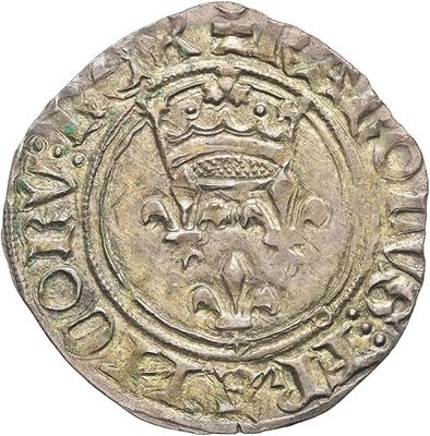a silver coin with a crown on top of it