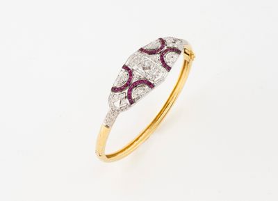 an art deco diamond and ruby ring