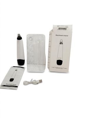 une boîte blanche contenant un appareil noir et blanc, une boîte blanche contenant un appareil noir et blanc et une boîte blanche contenant un appareil noir et blanc