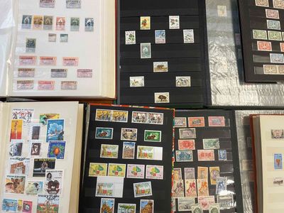 many different types of stamps on display on a table