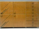 an image of a wooden cabinet with drawers and drawers