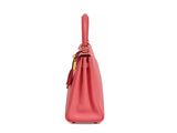 a pink handbag with a handle on a white background