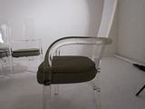 a chair that is sitting in the middle of a room