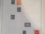 an open book with a picture of stamps and stamps on it
